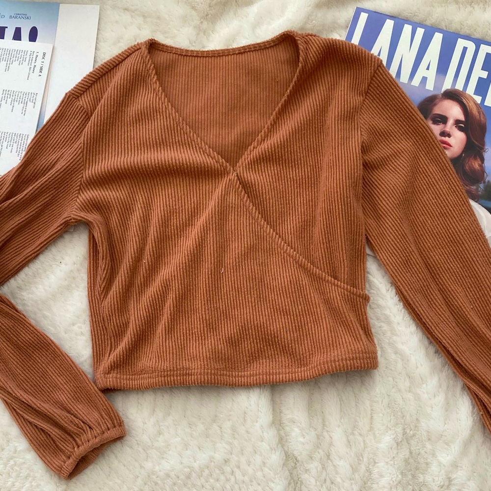 Warm toned, long sleeve, cinnamon/cream colored knit crossover top